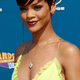 Illustration for article titled Rihanna Goes Glam For Gucci, Charity